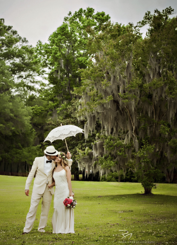 Fine-Art-Charleston-wedding-and-portrait-photographer;-wedding-photos-of-bride-and-groom-with-parasol.jpg